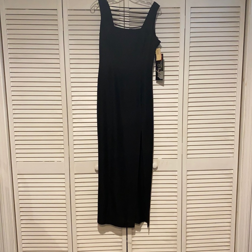 Formal, with intricate back, floor length w/slit.